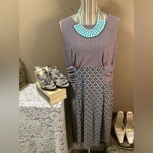 ROSE & ALI Elegant Patterned Sleeveless Dress in Blue and Pink.